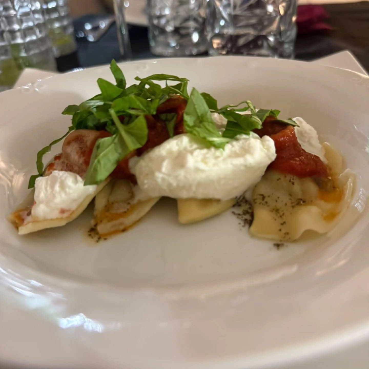 Ravioli di melanzane con salsa di totani